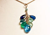 Cascade Necklace with blue topaz, followed by green onyx, green fluorite, blue topaz and  kyanite.  16