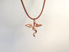 Flying Dragon necklace on  leather cord, Dragon necklace, golden bronze dragon necklace