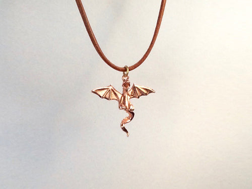 Flying Dragon necklace on  leather cord, Dragon necklace, golden bronze dragon necklace