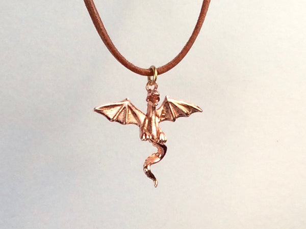 Flying Dragon necklace on  leather cord, Dragon necklace, golden bronze dragon necklace