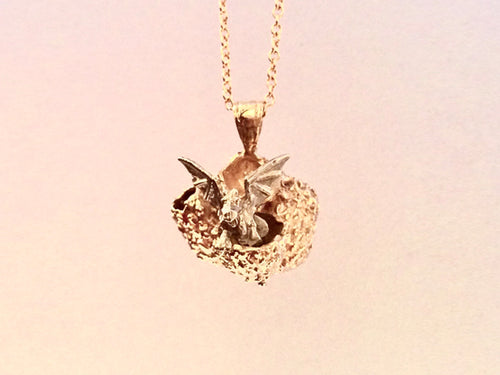 Baby dragon sitting in cracked open dragon egg- Golden and white bronze. Stephany Hitchcock Designs, www.StephanyHitchcock.com, Stephany Hitchcock Designs, www.StephanyHitchcock.com, Bridesmaid's gift, gift for girlfriend, gift for her, birthday jewelry